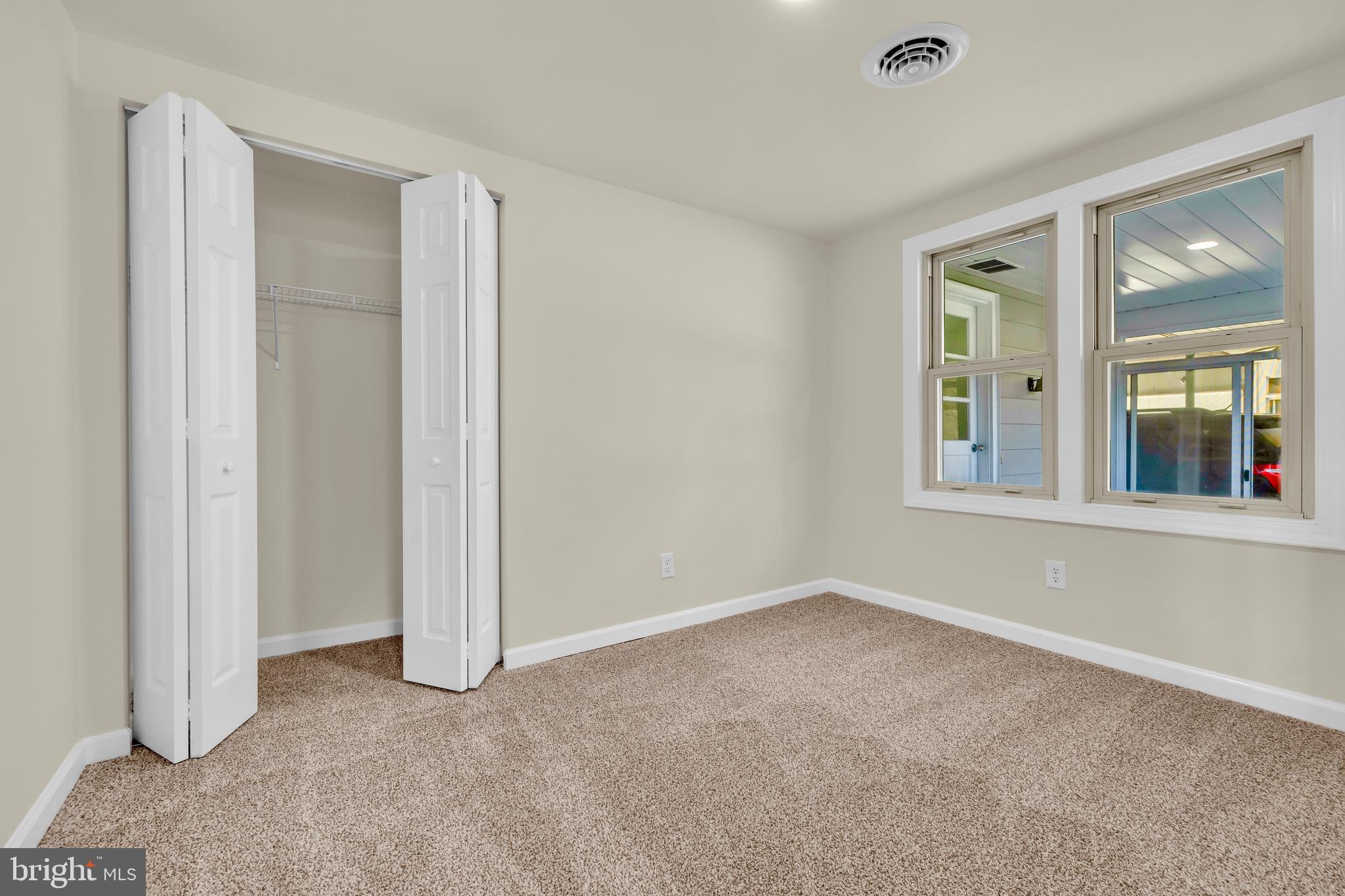 334 Deep Shore Road Denton, MD 21629 - Photo 19 of 48 an empty room with windows