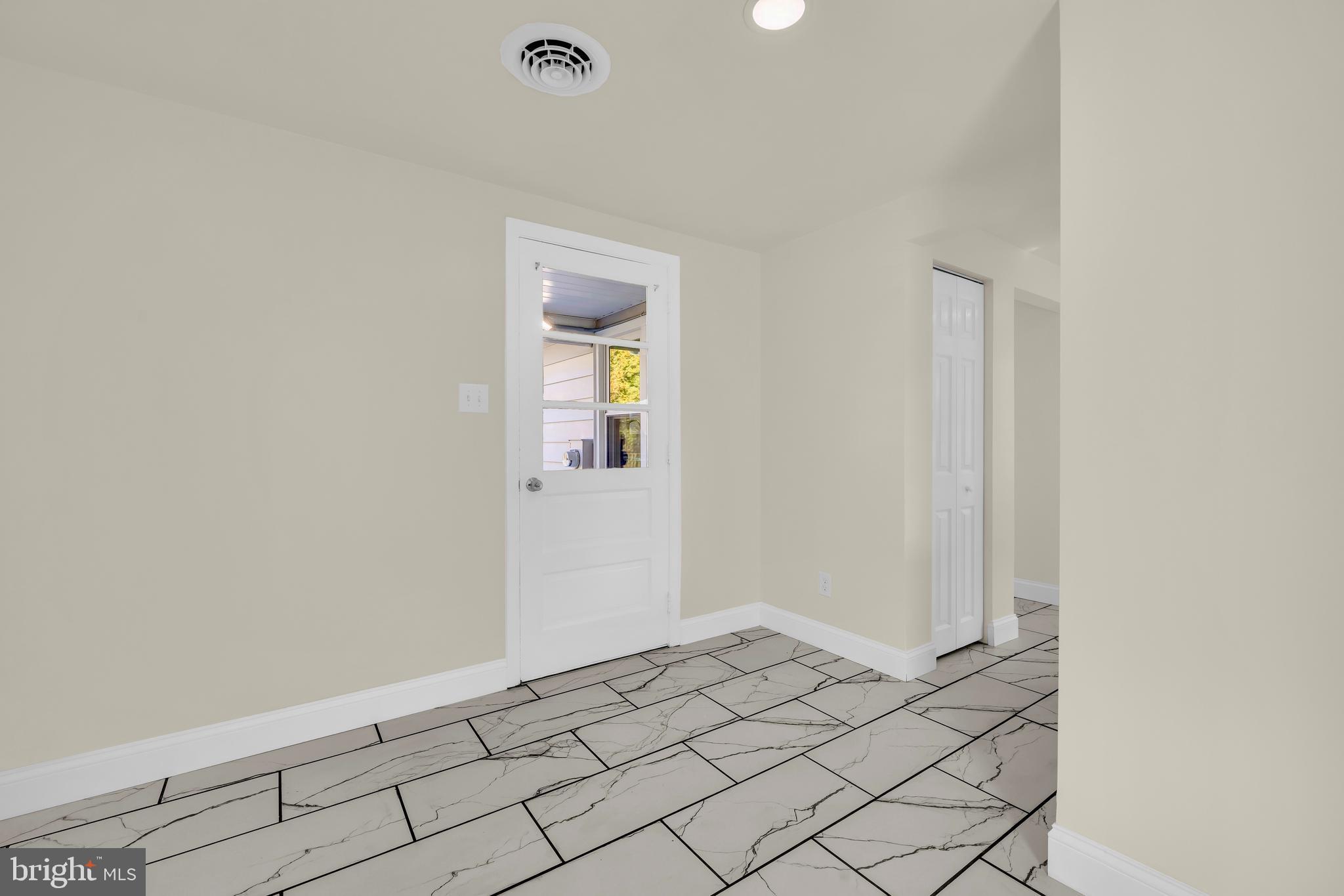 334 Deep Shore Road Denton, MD 21629 - Photo 22 of 48 a view of an empty room and wooden floor