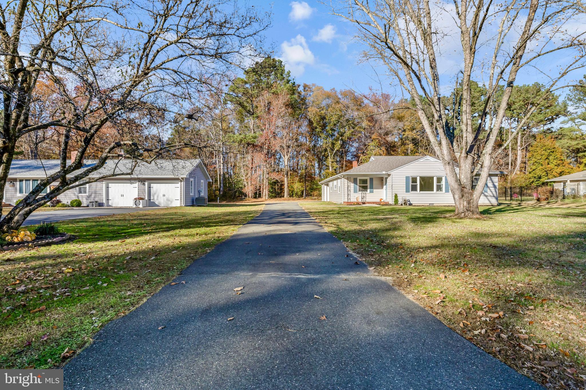 334 Deep Shore Road Denton, MD 21629 - Photo 3 of 48 a house with trees in the background