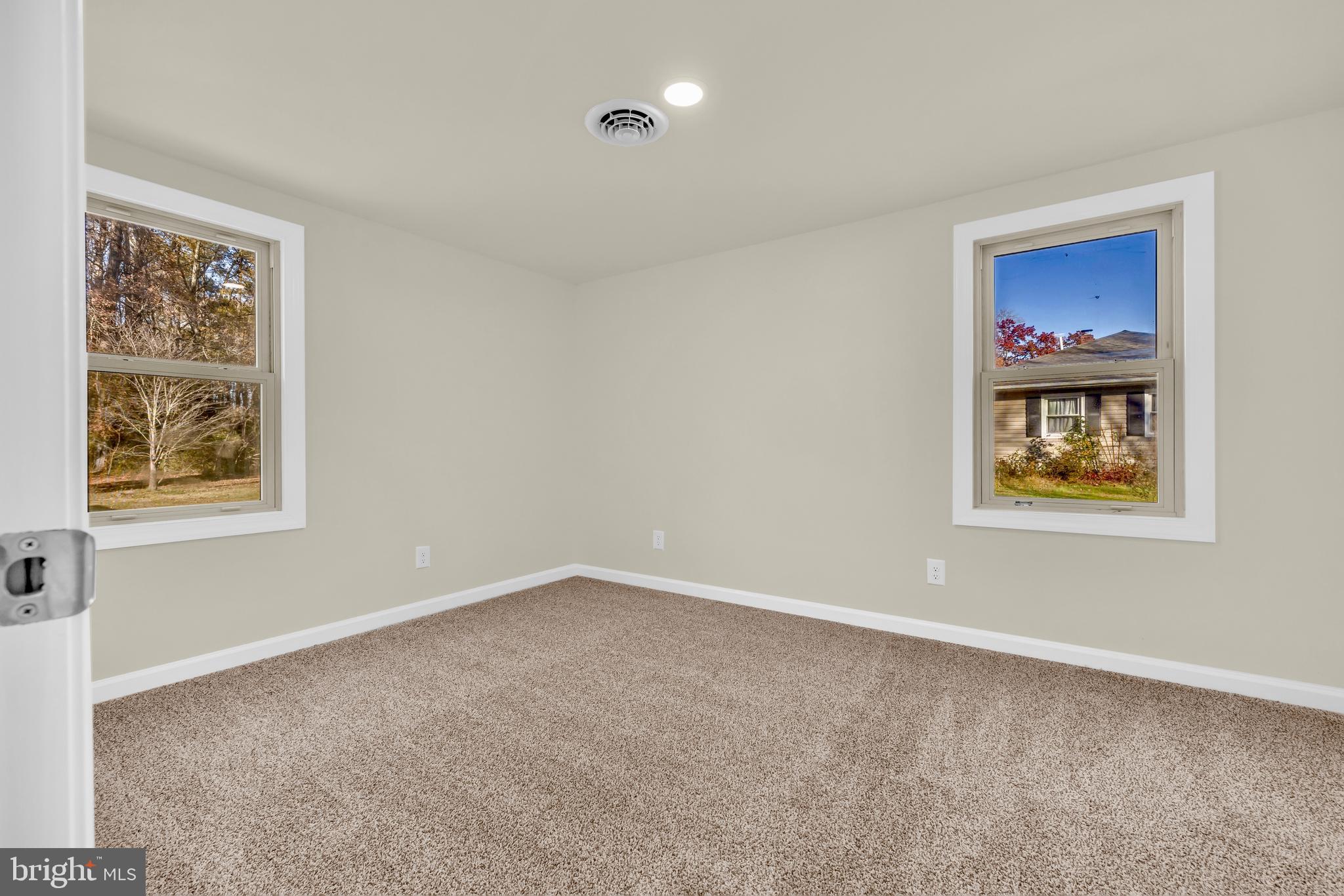334 Deep Shore Road Denton, MD 21629 - Photo 33 of 48 a view of an empty room with a window