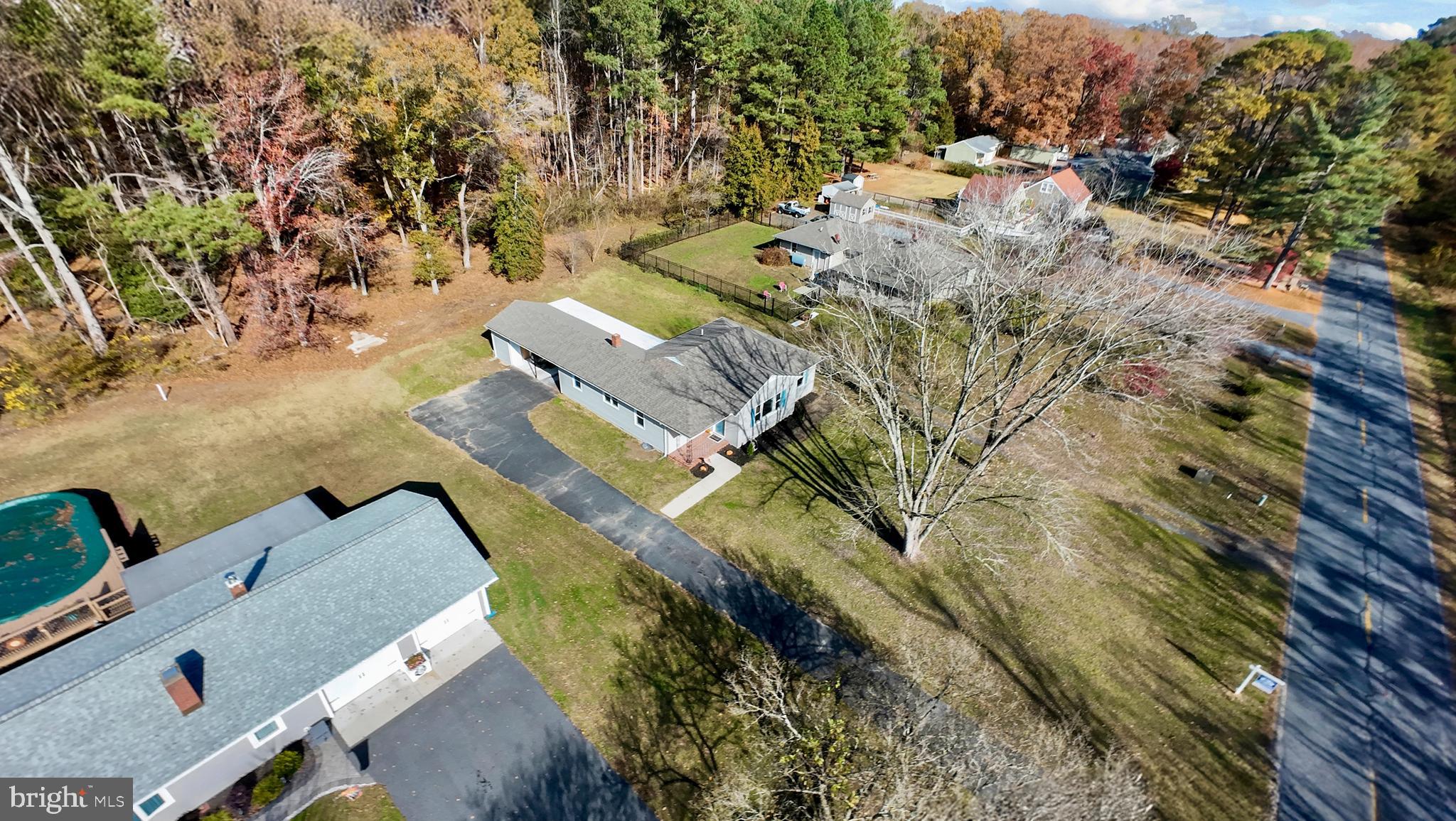 334 Deep Shore Road Denton, MD 21629 - Photo 47 of 48 an aerial view of residential houses with outdoor space