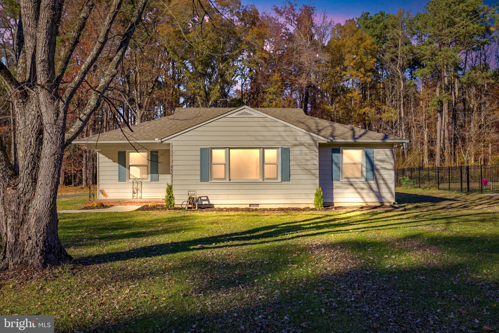 334 Deep Shore Road Denton, MD 21629 - Photo 7 of 48 a front view of a house with a yard