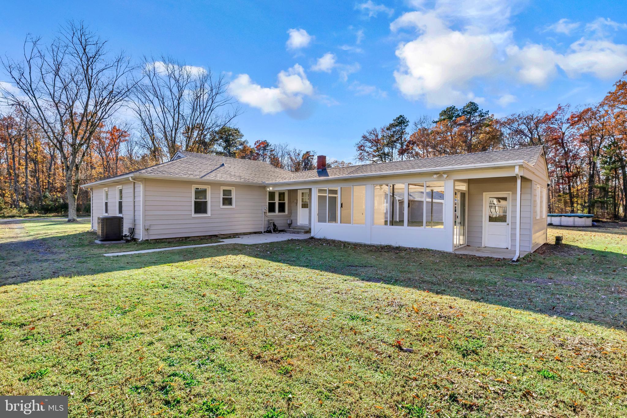 334 Deep Shore Road Denton, MD 21629 - Photo 9 of 48 a view of a yard with a house in the background