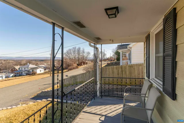 a view of a balcony with ocean view