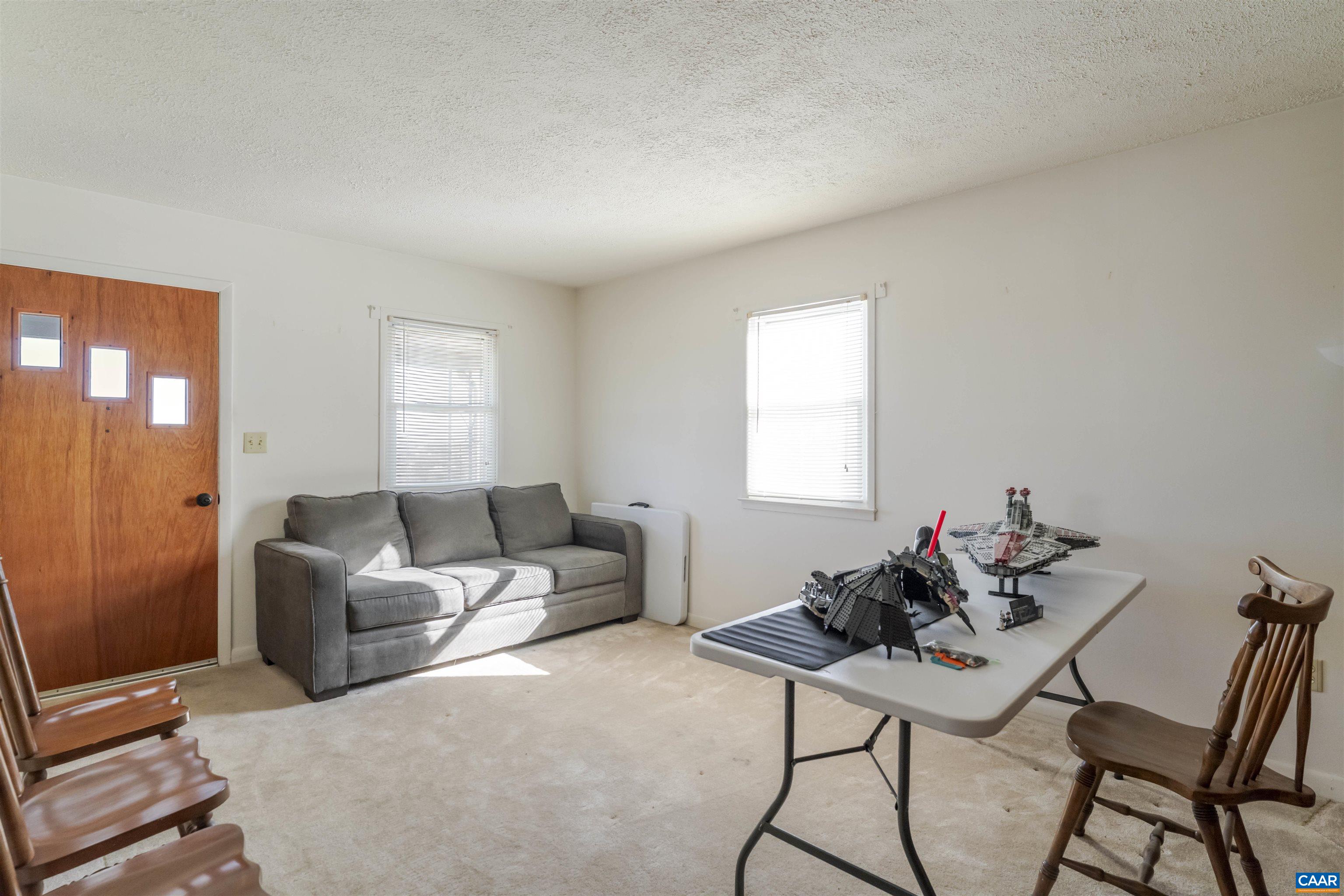 906 Alta Street Staunton, VA 24401 - Photo 5 of 34 a living room with furniture and a window