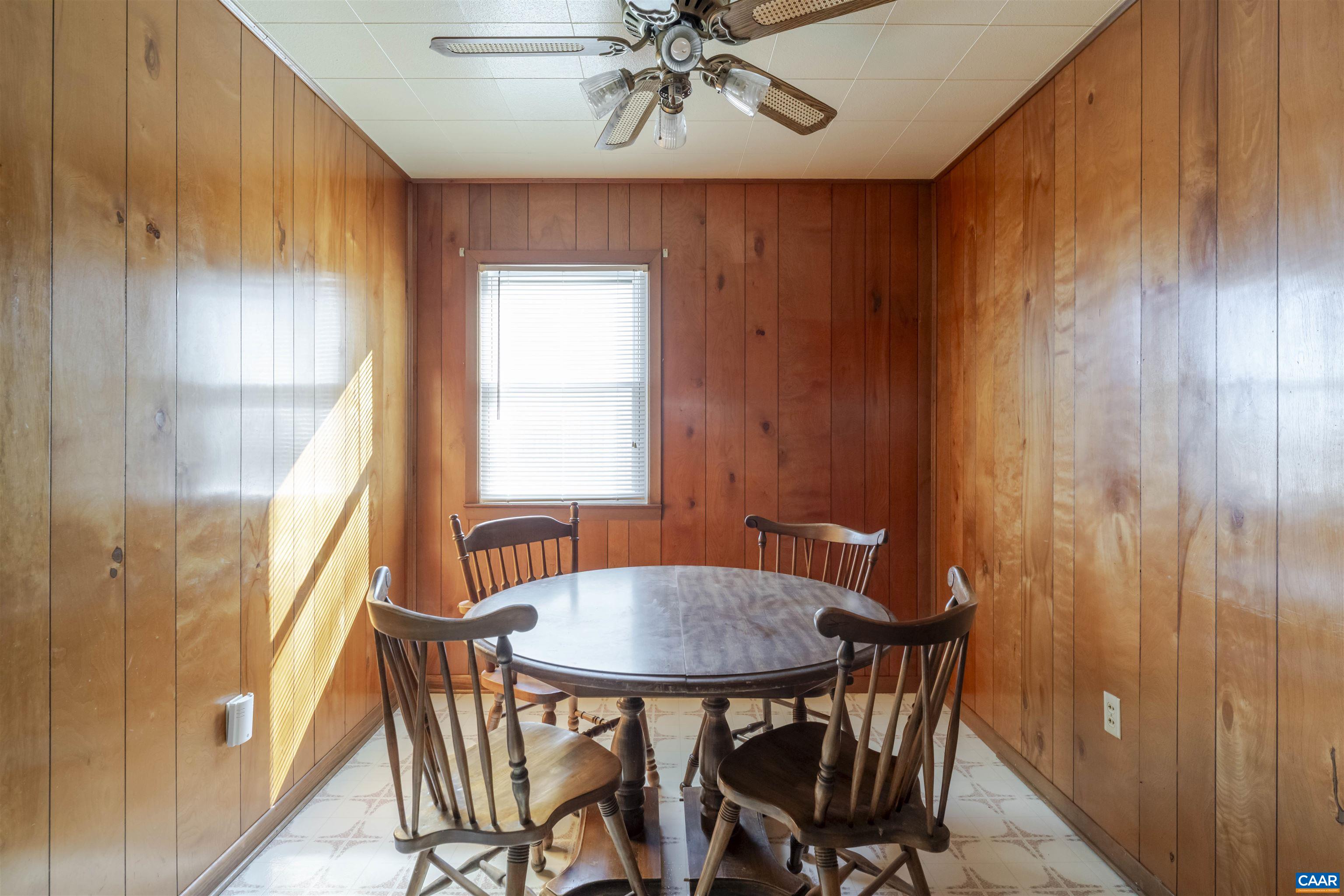 906 Alta Street Staunton, VA 24401 - Photo 8 of 34 a view of a dining room with furniture and window