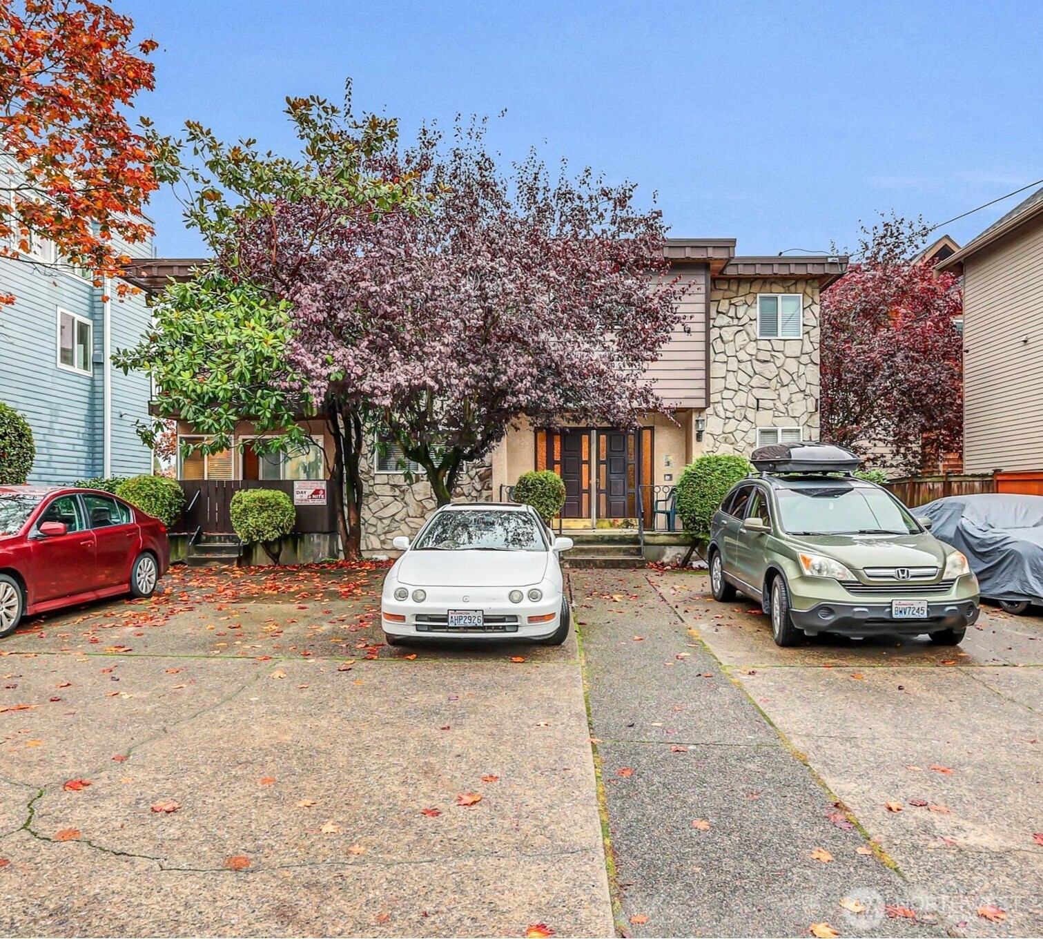 a car parked in front of a house