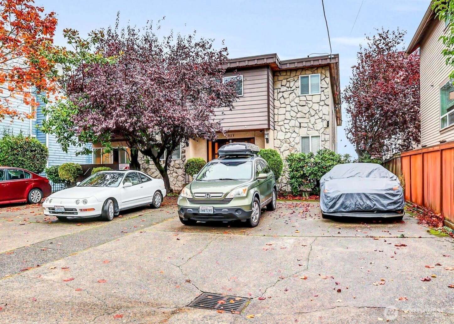 3828 Whitman Avenue North Seattle, WA 98103 - Photo 2 of 8 a view of a cars parked in front of a house