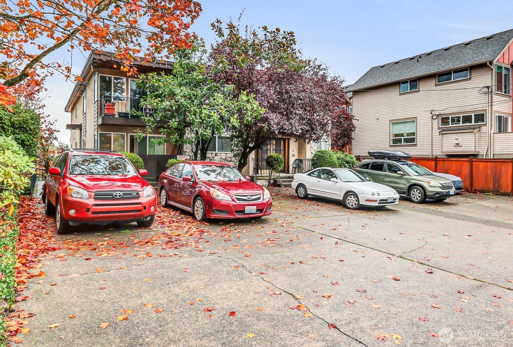 3828 Whitman Avenue North Seattle, WA 98103 - Photo 3 of 8 a car parked in front of a house