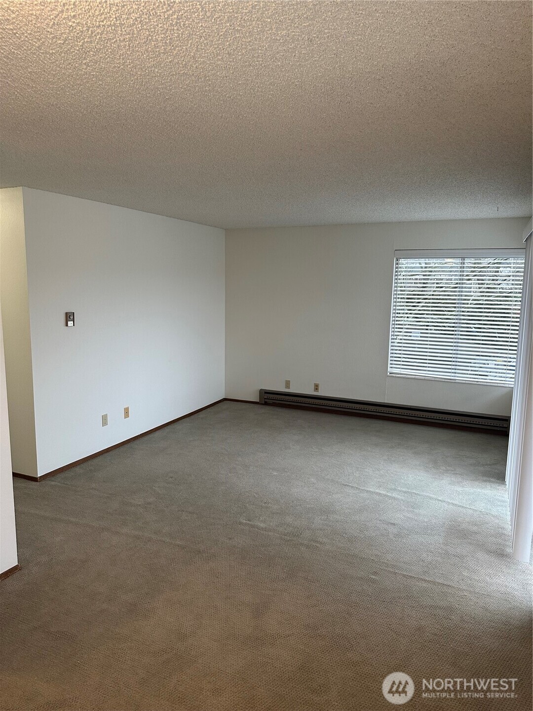 3828 Whitman Avenue North Seattle, WA 98103 - Photo 6 of 8 a view of room and window