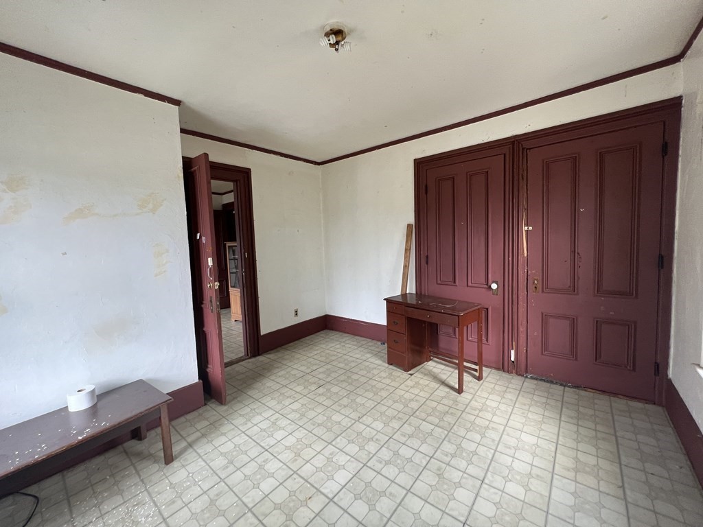 2 Stevens Road Worcester, MA 01603 - Photo 13 of 22 a view of a room with furniture and a window