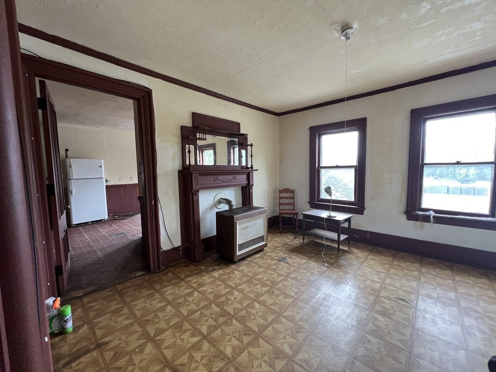 2 Stevens Road Worcester, MA 01603 - Photo 17 of 22 a bedroom with furniture and a window