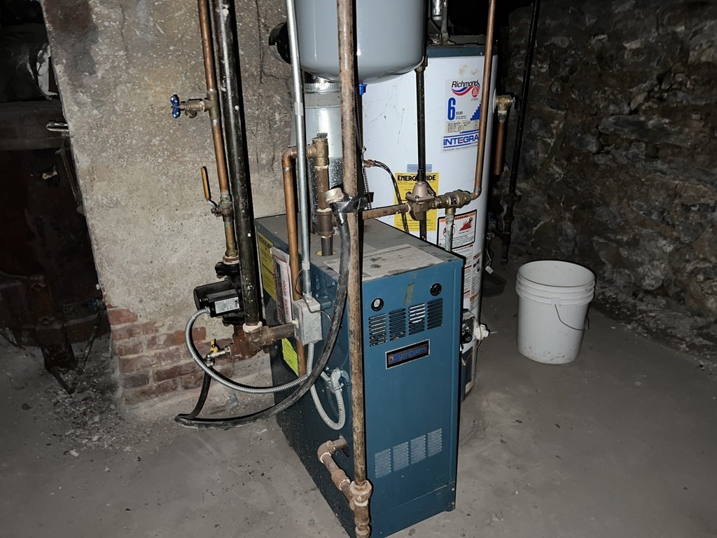 2 Stevens Road Worcester, MA 01603 - Photo 20 of 22 a bathroom with a toilet and a shower