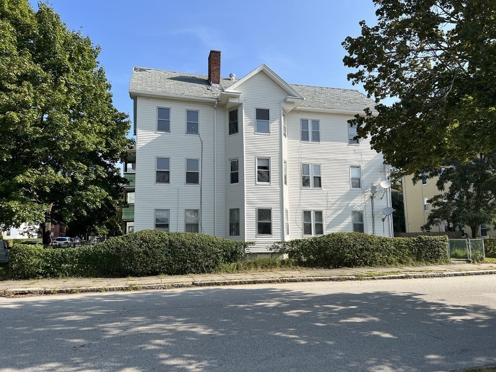 2 Stevens Road Worcester, MA 01603 - Photo 2 of 22 a front view of a house with a yard
