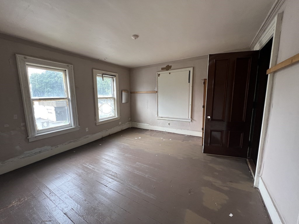2 Stevens Road Worcester, MA 01603 - Photo 7 of 22 an empty room with windows