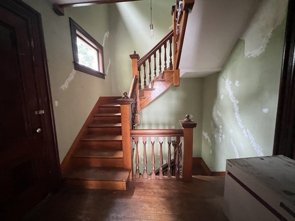 2 Stevens Road Worcester, MA 01603 - Photo 8 of 22 a view of entryway and hall with wooden floor