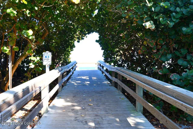 a view of roof with wooden floor