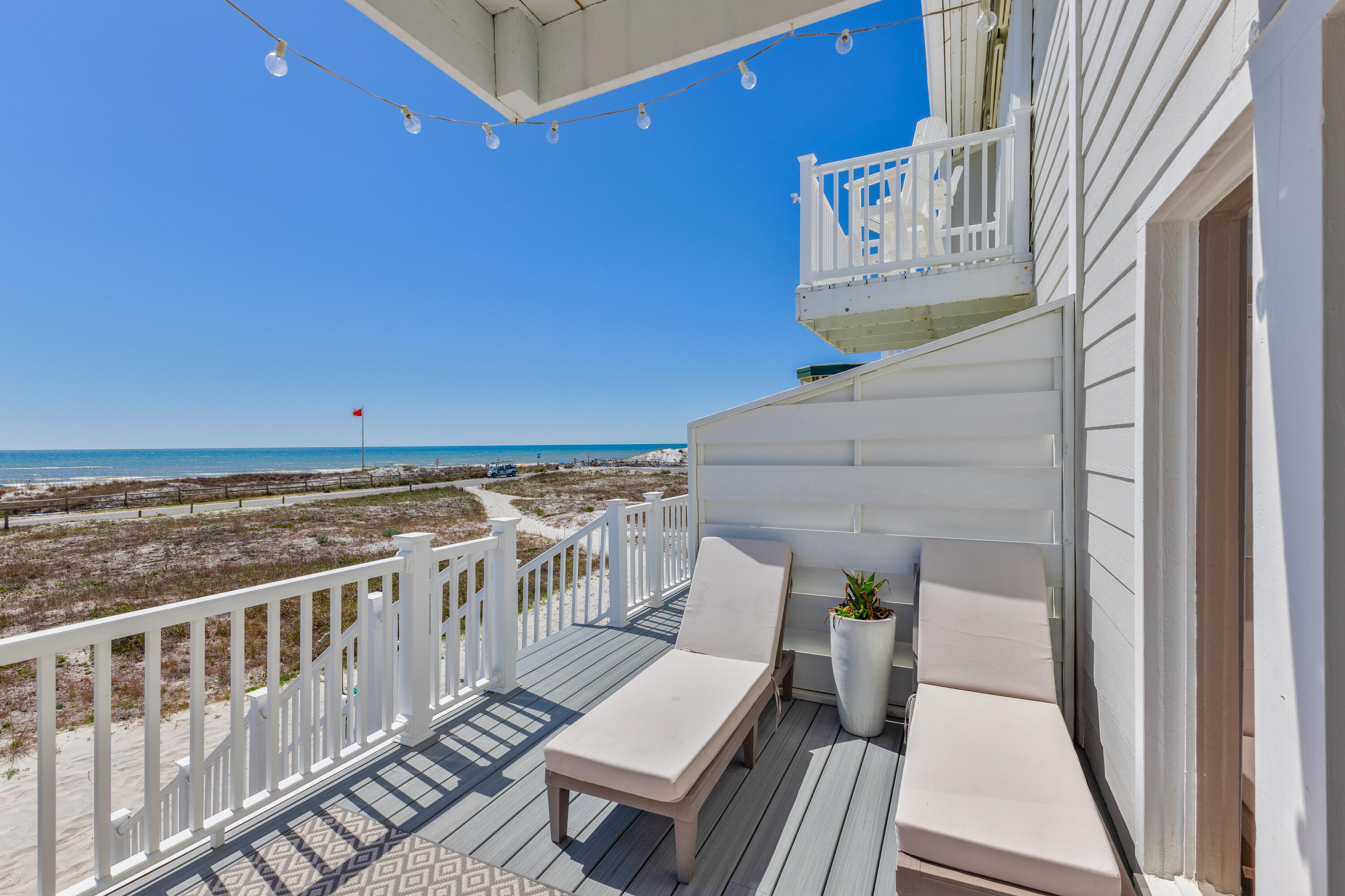 207 Beachfront Trail, Unit 10 Santa Rosa Beach, FL 32459 - Photo 11 of 47 a view of a balcony with wooden floor
