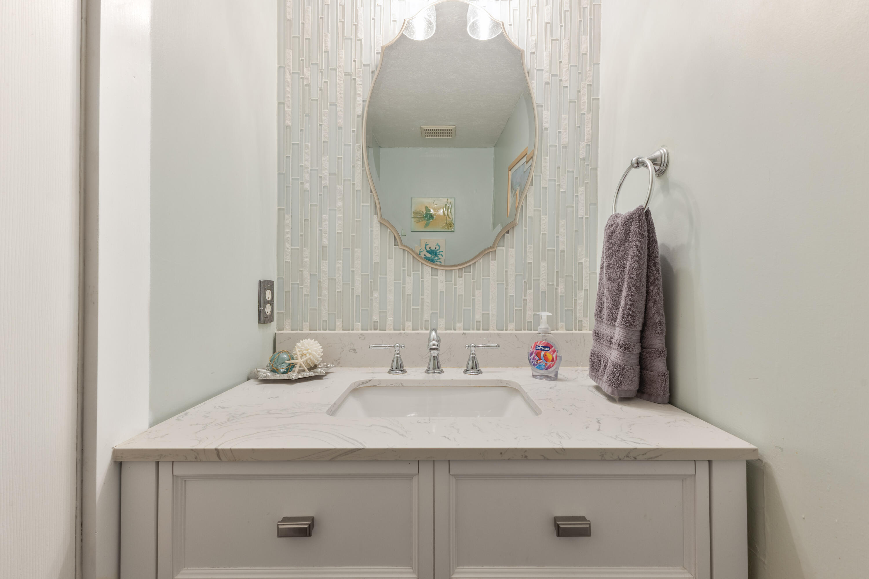 207 Beachfront Trail, Unit 10 Santa Rosa Beach, FL 32459 - Photo 21 of 47 a bathroom with a sink and a mirror