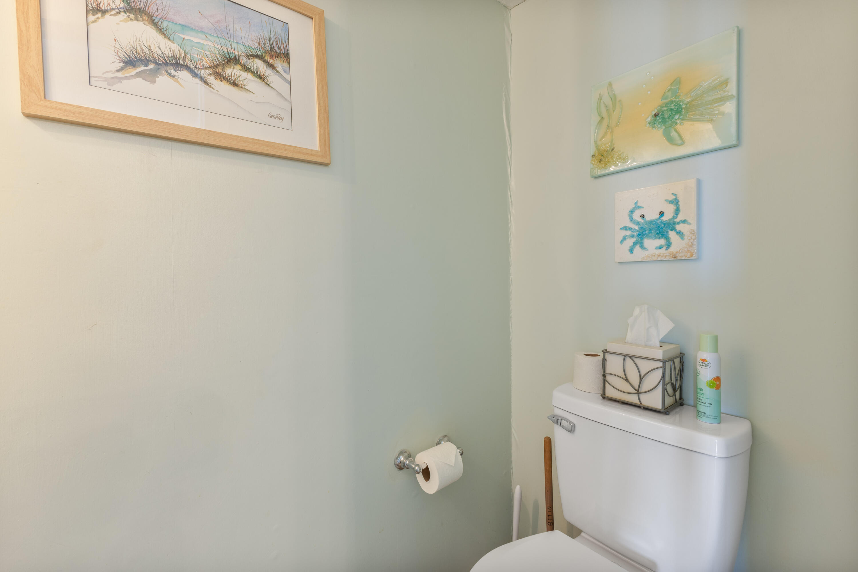 207 Beachfront Trail, Unit 10 Santa Rosa Beach, FL 32459 - Photo 22 of 47 a white toilet sitting next to a bathroom sink