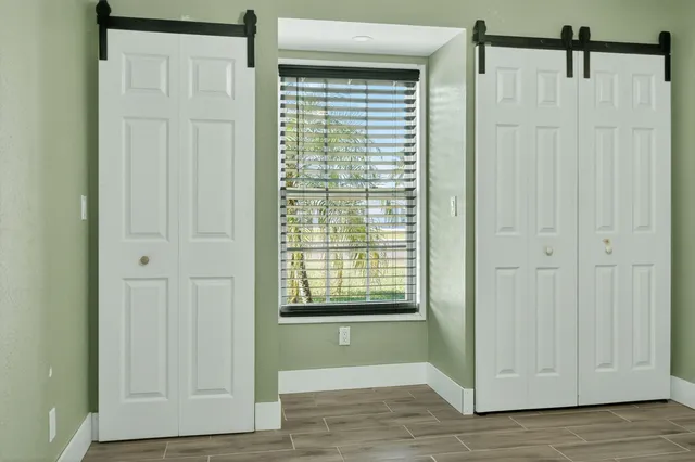 a view of a room that has a window in it