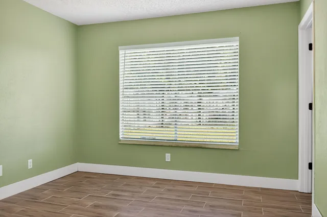 a view of a room that has a window in it