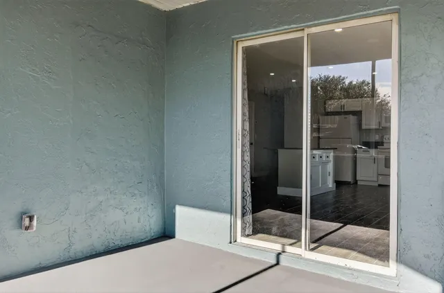 a bathroom with a shower and a toilet