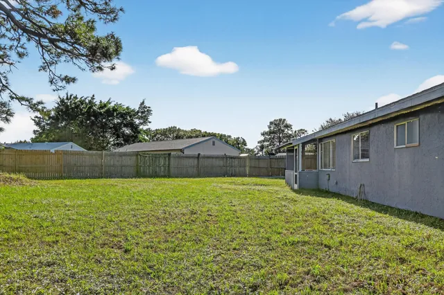 a house view with garden space
