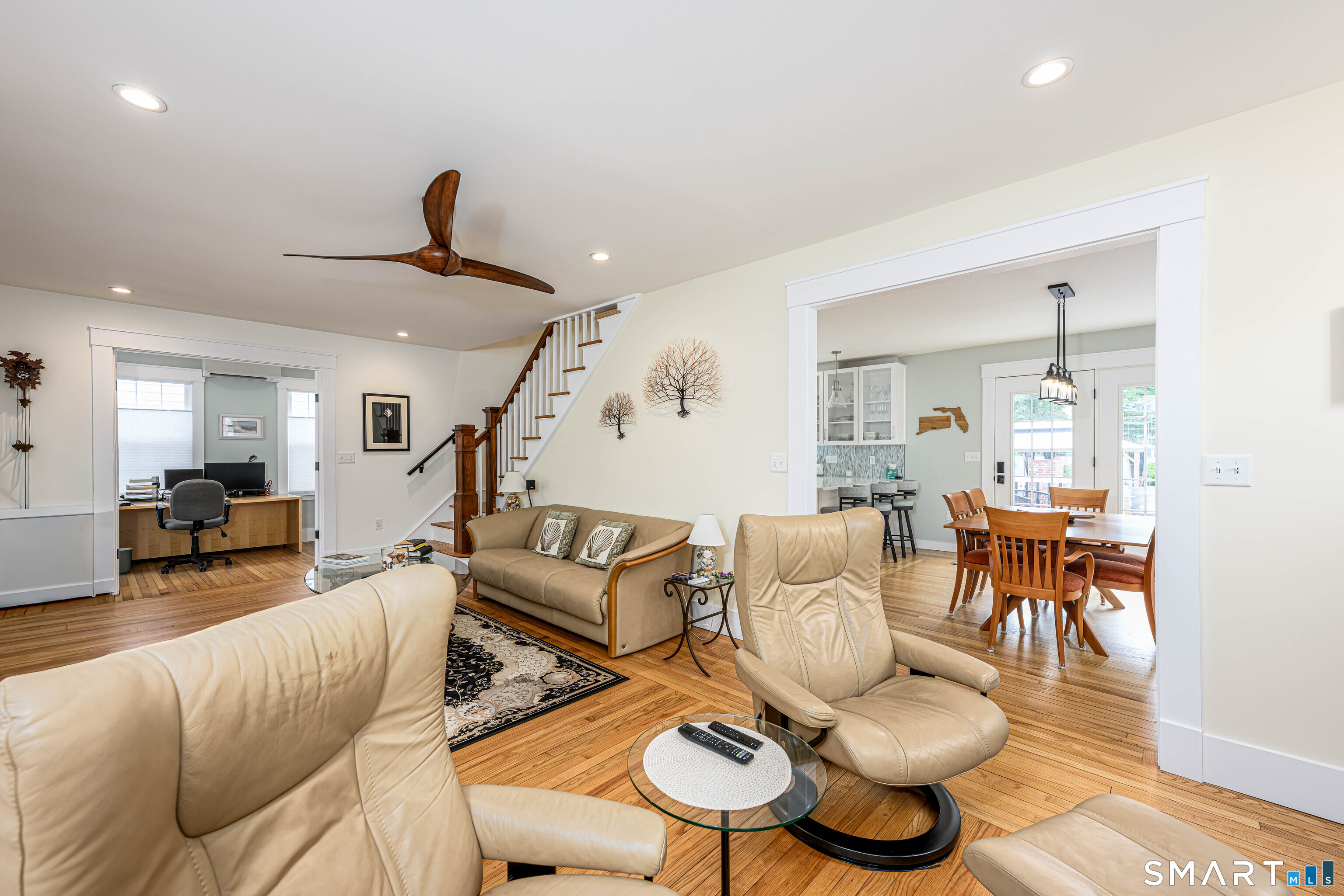 77 Prospect Road East Haven, CT 06512 - Photo 6 of 31 Living Room looks into the kitchen and the office. To the left is the enclosed, heated sun room/porch.