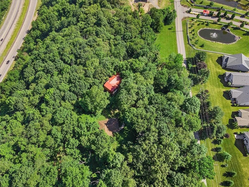 664 Duff Road Sewickley, PA 15143 - Photo 12 of 24 a backyard of a house with a yard and seating area