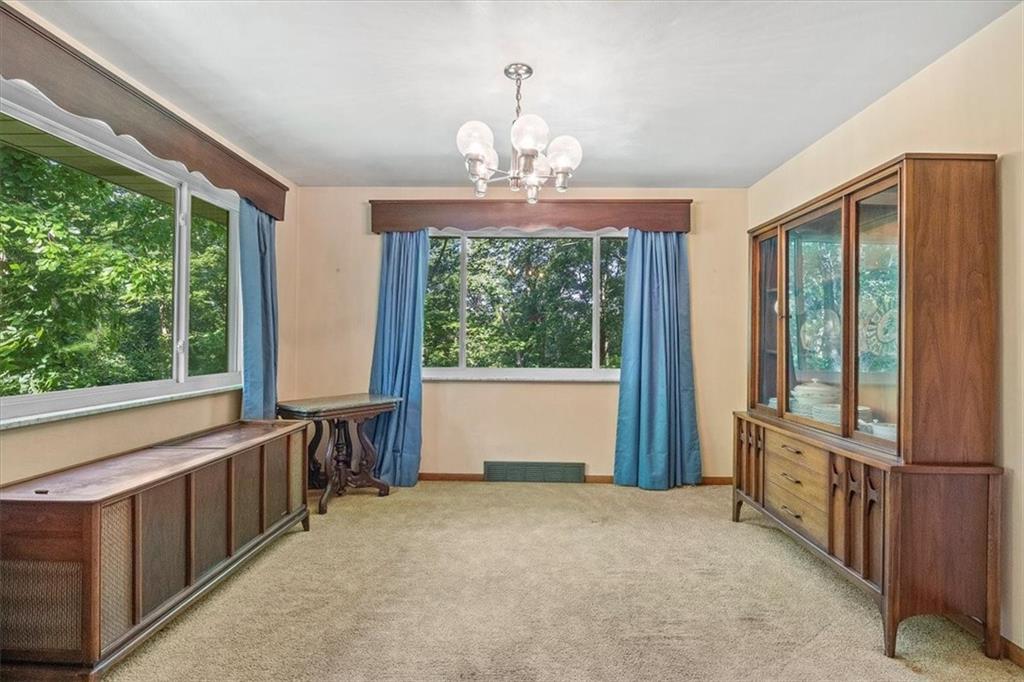 664 Duff Road Sewickley, PA 15143 - Photo 18 of 24 a view of an empty room with a window