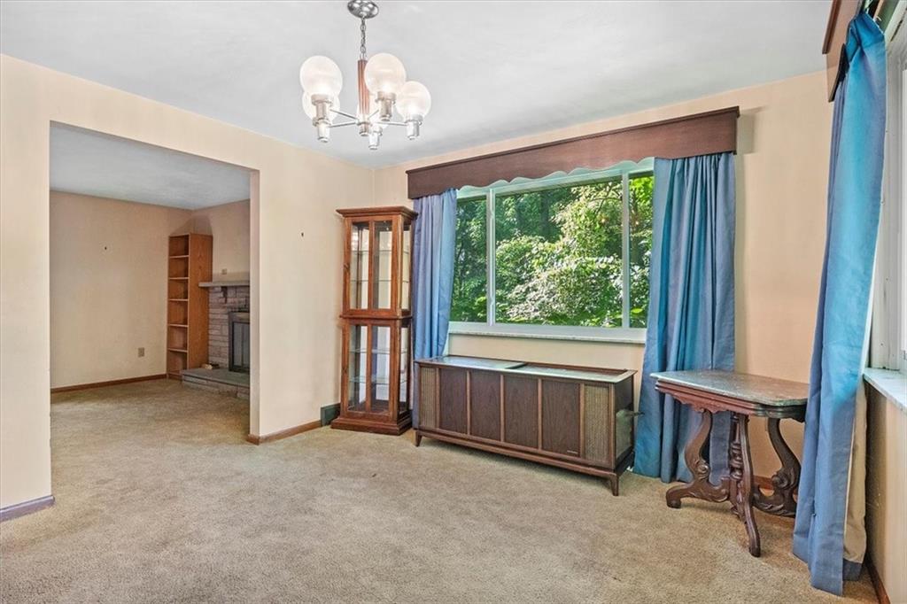 664 Duff Road Sewickley, PA 15143 - Photo 19 of 24 wooden floor in an empty room with a window