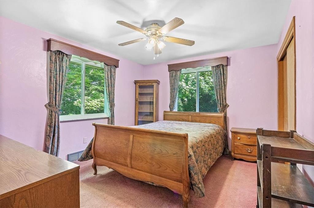 664 Duff Road Sewickley, PA 15143 - Photo 20 of 24 a bed room with a bed and a window