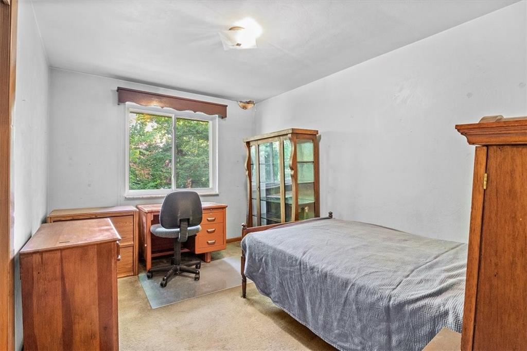 664 Duff Road Sewickley, PA 15143 - Photo 21 of 24 a bedroom with a bed chairs and a desk