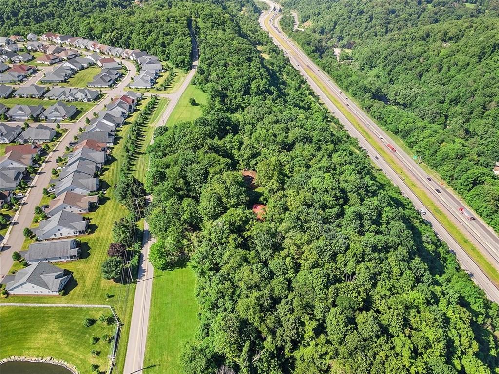 664 Duff Road Sewickley, PA 15143 - Photo 8 of 24 a view of a yard with a tree