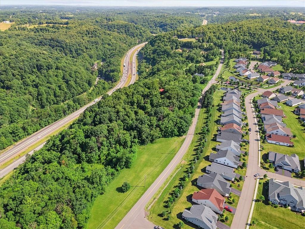 664 Duff Road Sewickley, PA 15143 - Photo 9 of 24 an aerial view of residential houses with outdoor space and trees