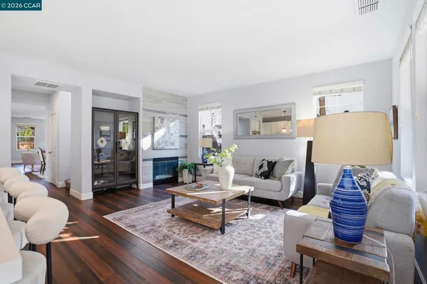 a very nice looking dining room with a large window