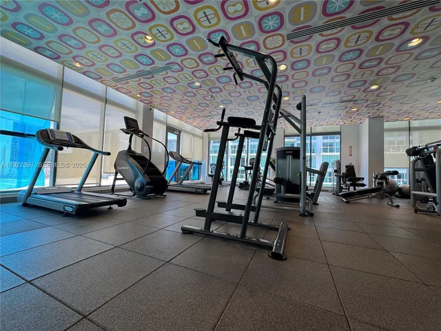 a large room with a large kitchen appliances