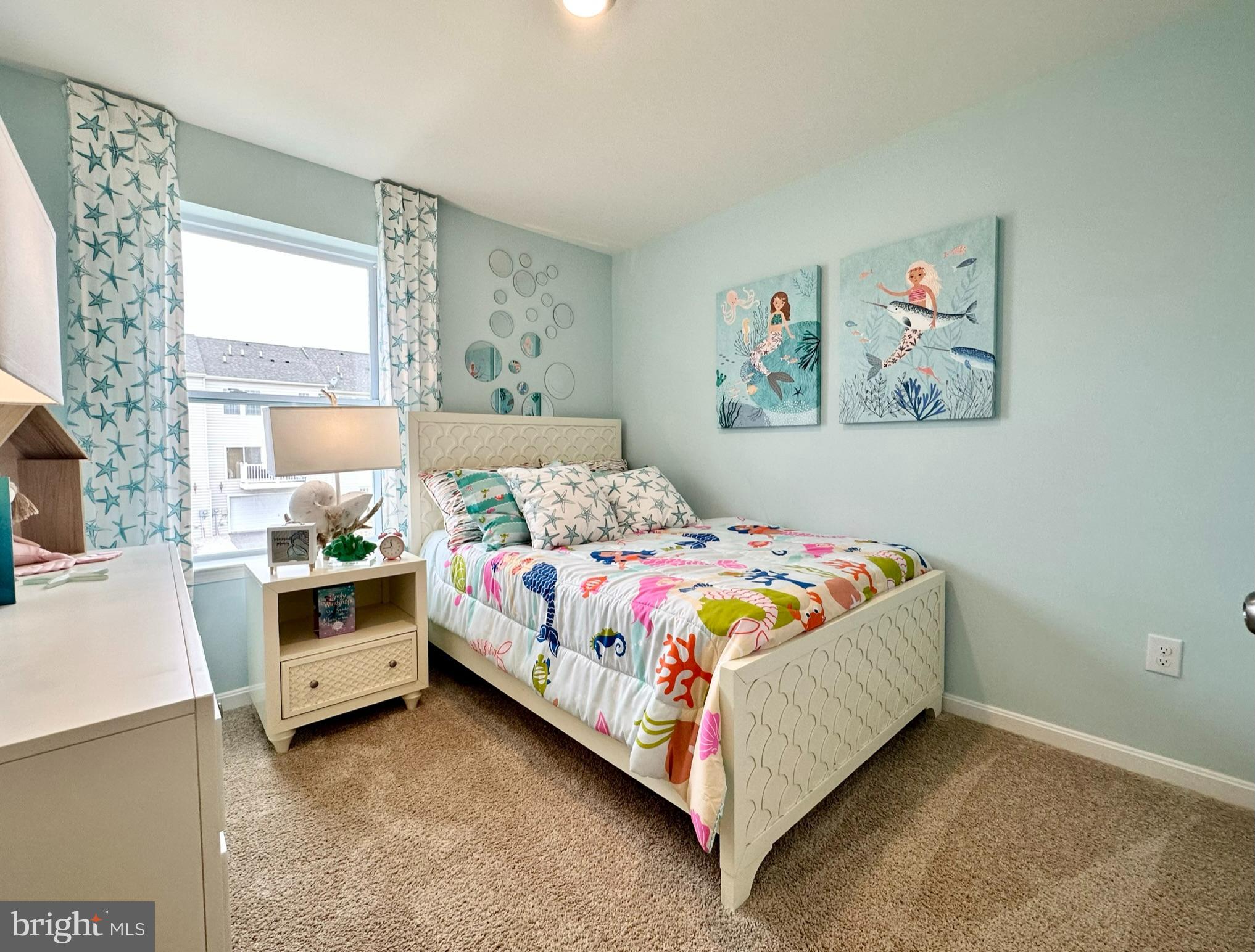 819 Mersey Lane Salisbury, MD 21801 - Photo 17 of 28 a bedroom with a bed and a painting on the wall