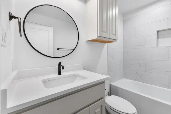 a view of small space with wooden floor