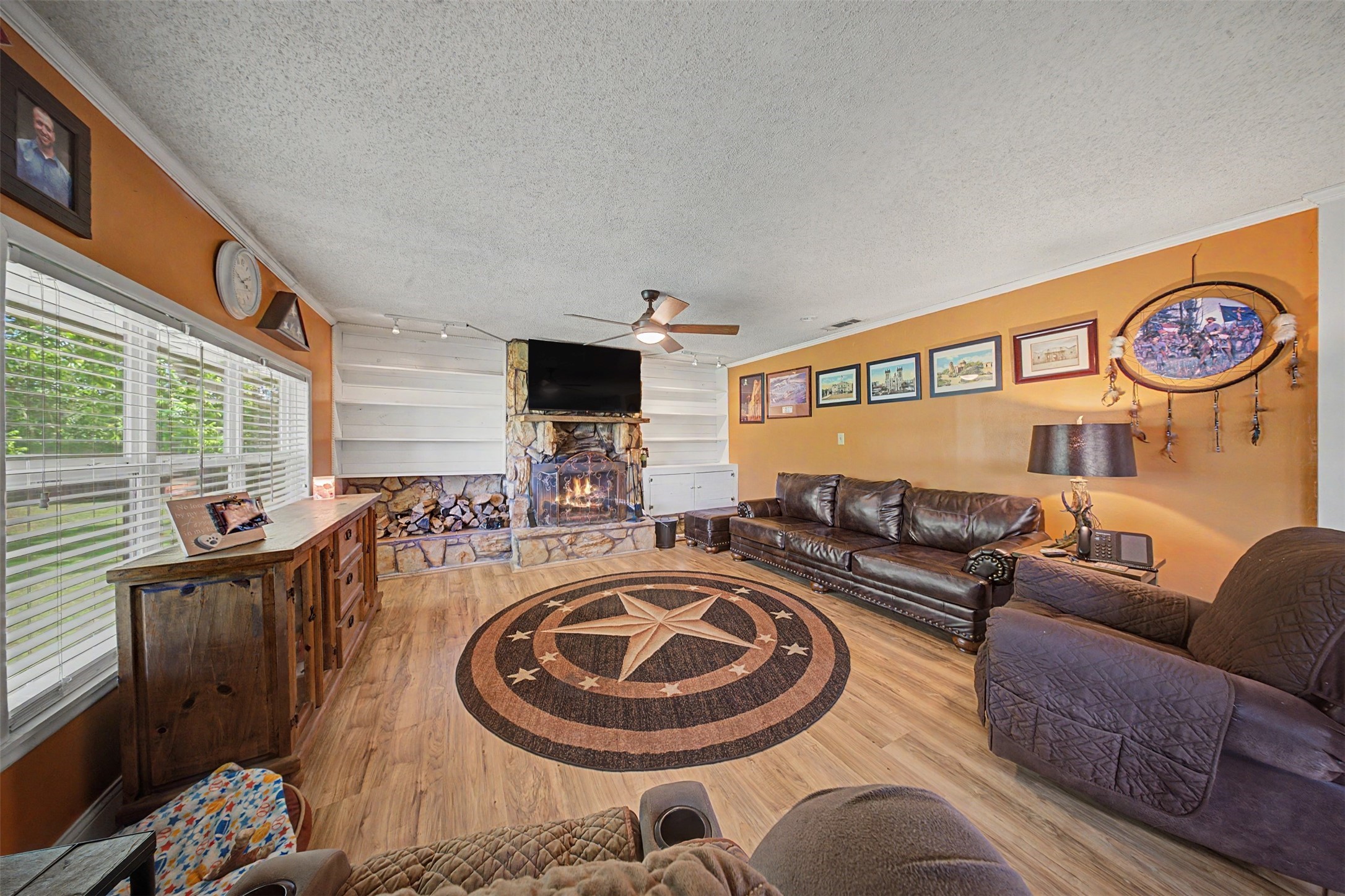 1442 East Johnson Drive Rusk, TX 75785 - Photo 11 of 34 Another view of this awesome living space. Take note of the pretty crown moulding and all of the space this space has to offer!