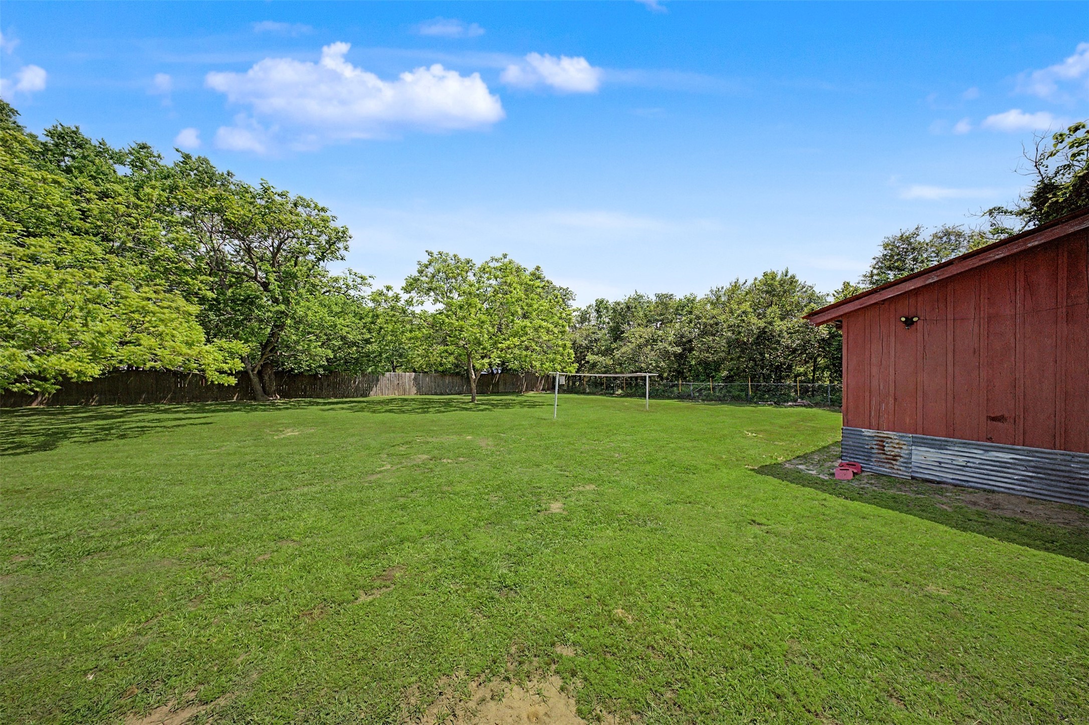 1442 East Johnson Drive Rusk, TX 75785 - Photo 22 of 34 This backyard is luscious and private offering tons of space!