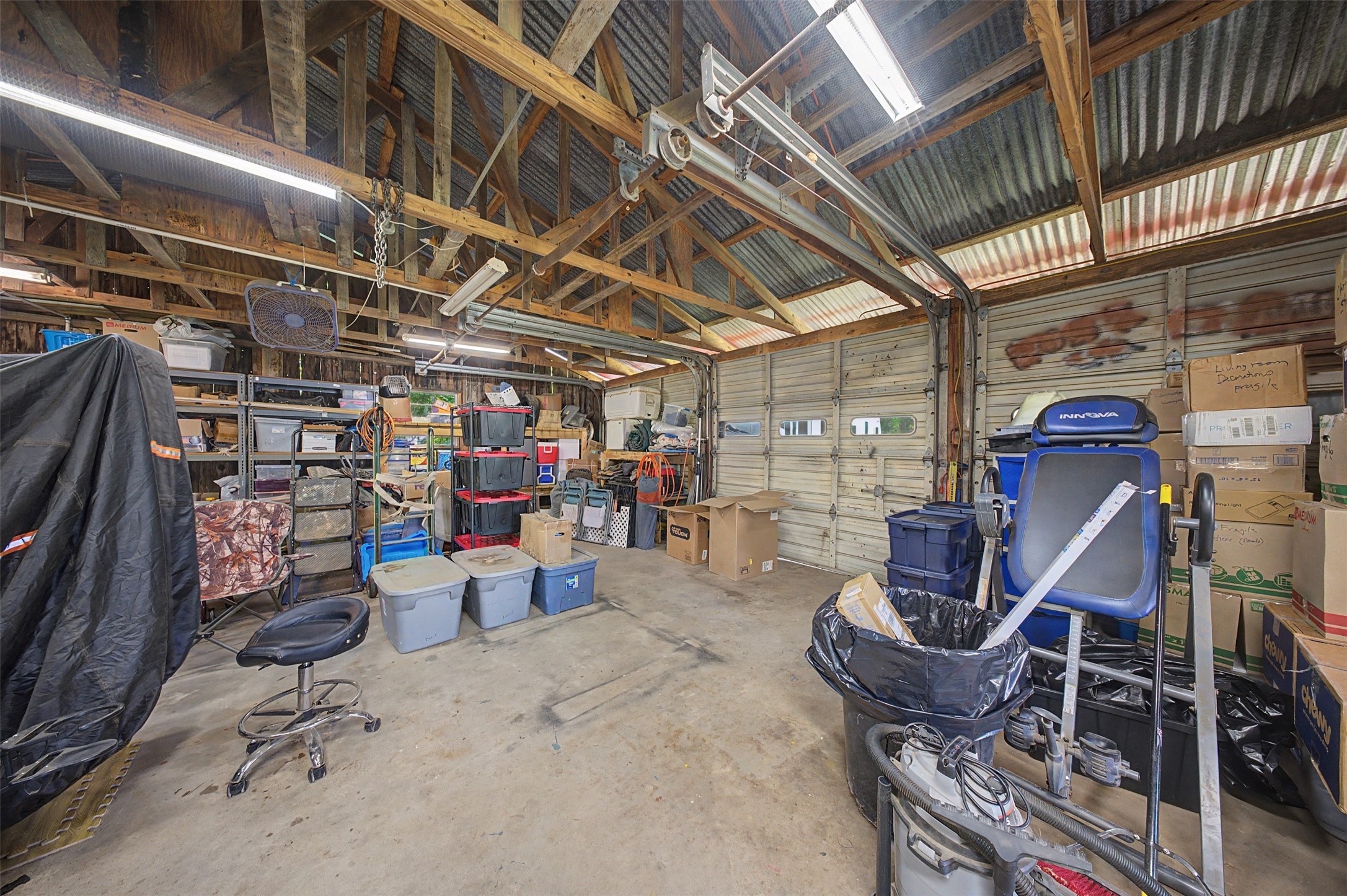 1442 East Johnson Drive Rusk, TX 75785 - Photo 25 of 34 Another view of the garage. You can easily get done all of your projects here and there is tons of storage space.