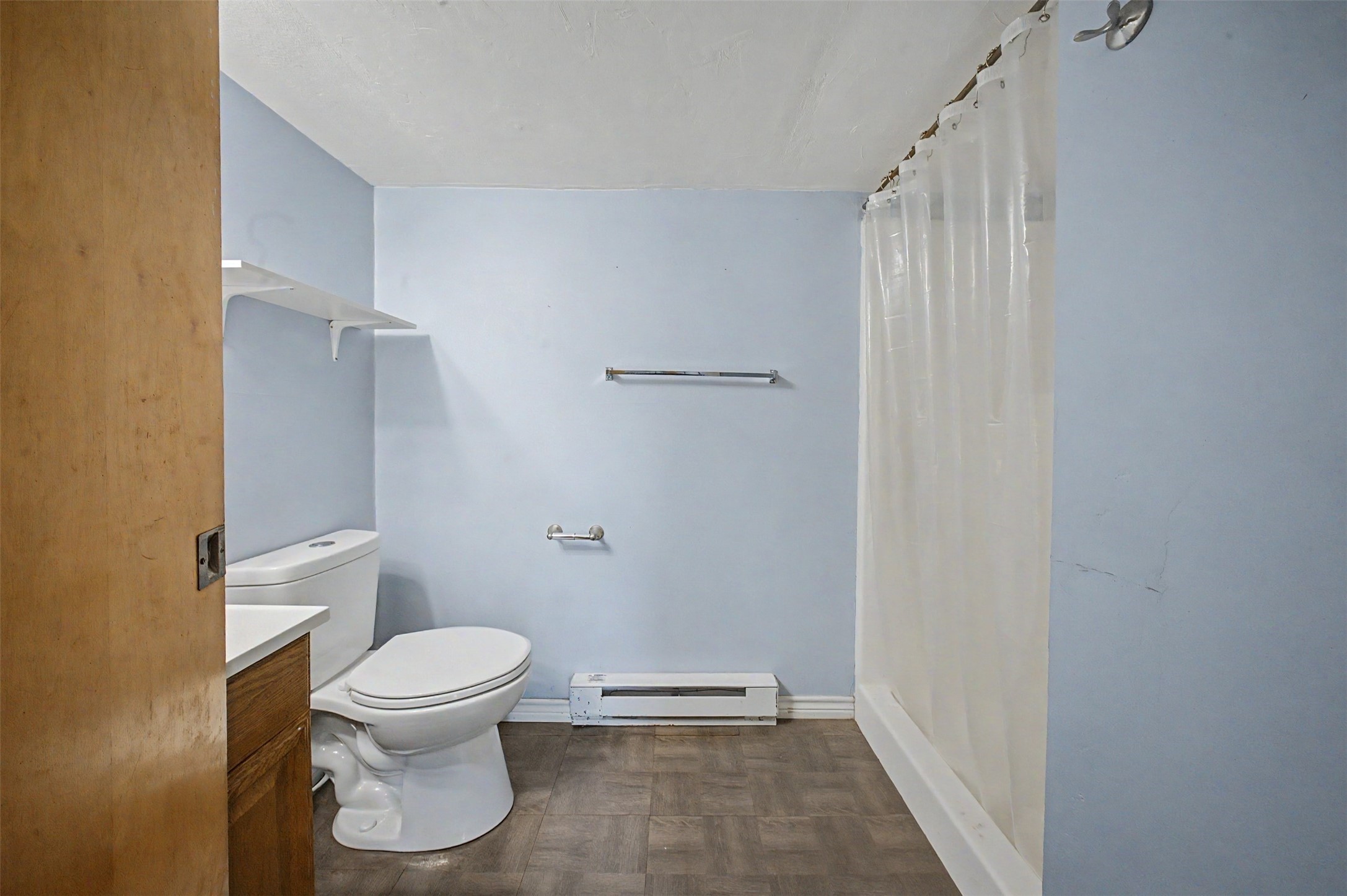 1442 East Johnson Drive Rusk, TX 75785 - Photo 30 of 34 This spacious bathroom features a nice stand up shower and lovely flooring.