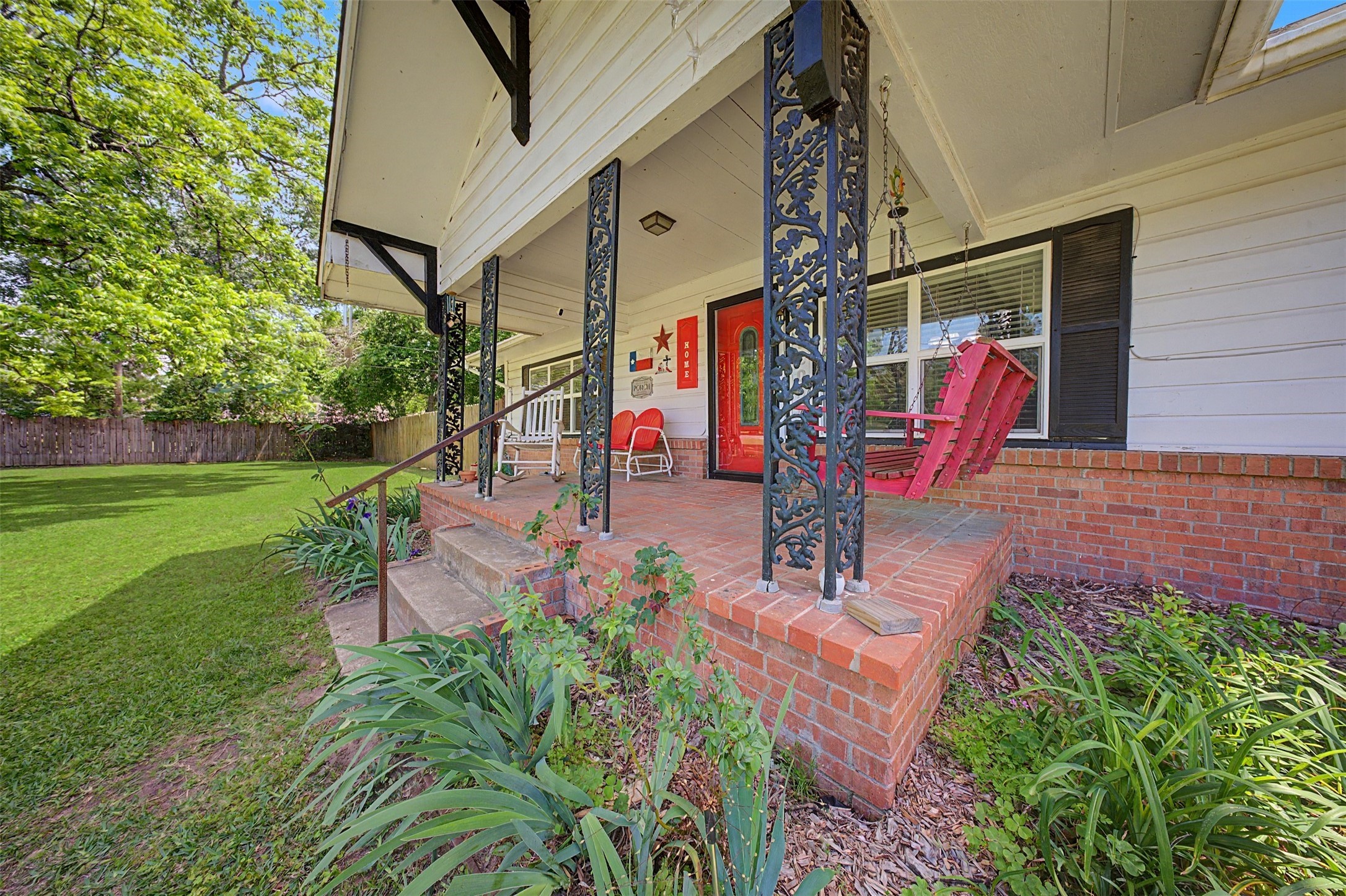 1442 East Johnson Drive Rusk, TX 75785 - Photo 4 of 34 Suh a cute and charming covered front porch perfect for those beautiful Texas nights.