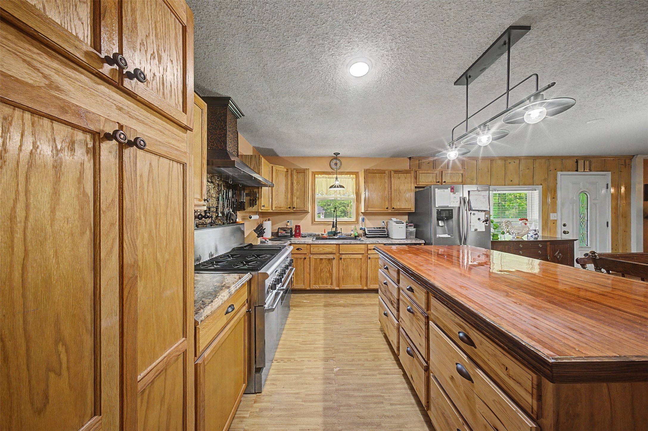 1442 East Johnson Drive Rusk, TX 75785 - Photo 8 of 34 Attractive lighting and the huge island are icing on the cake!