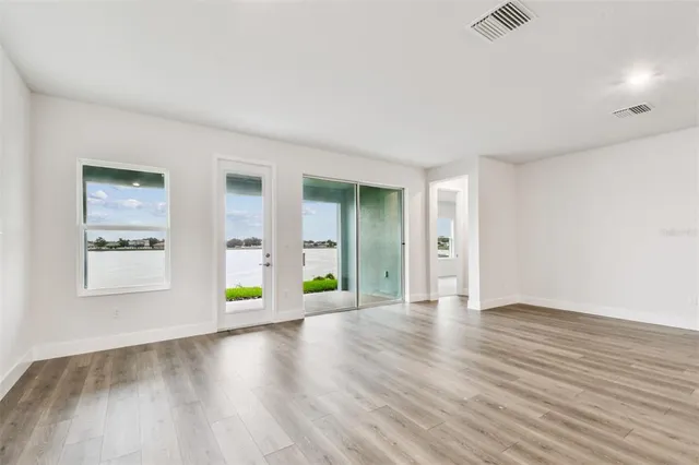 an empty room with windows