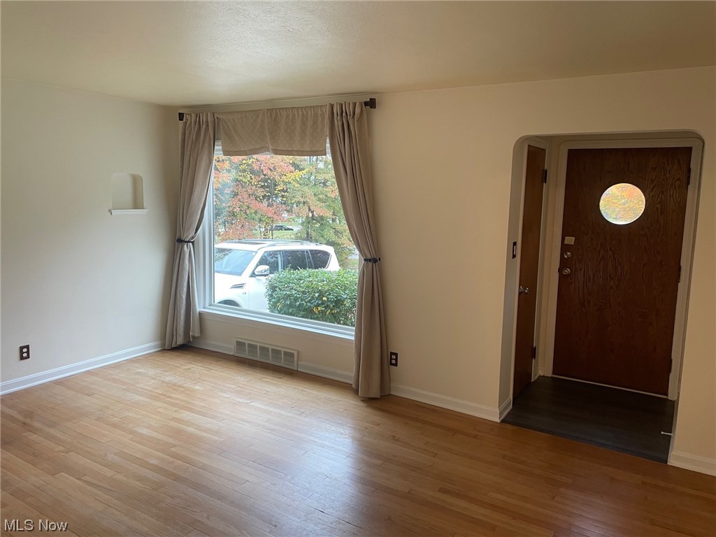 5972 Crossview Road Independence, OH 44131 - Photo 2 of 33 Entrance foyer with light hardwood / wood-style flooring