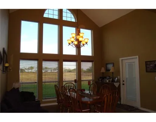 a view of living room and dining room