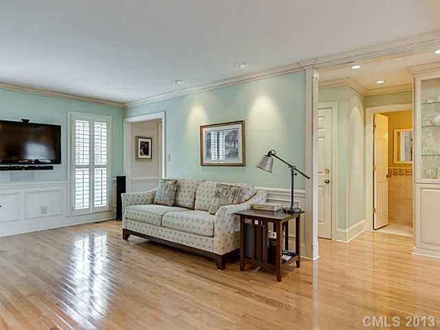 7227 Alexander Road Charlotte, NC 28270 - Photo 8 of 16 a living room with furniture and a flat screen tv